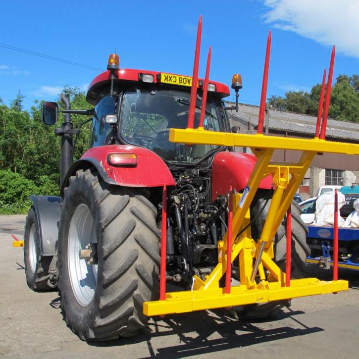 Hydraulically folding Double Front or Rear Bale Spike for tractors.